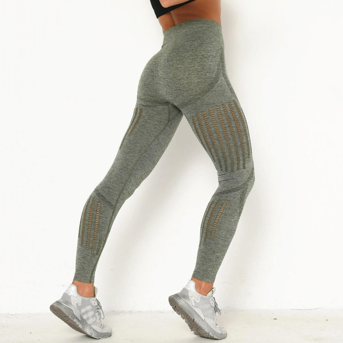 Elegant high-waist seamless leggings for women in gray, featuring booty-lifting design and comfort fit with polyester-spandex blend.
